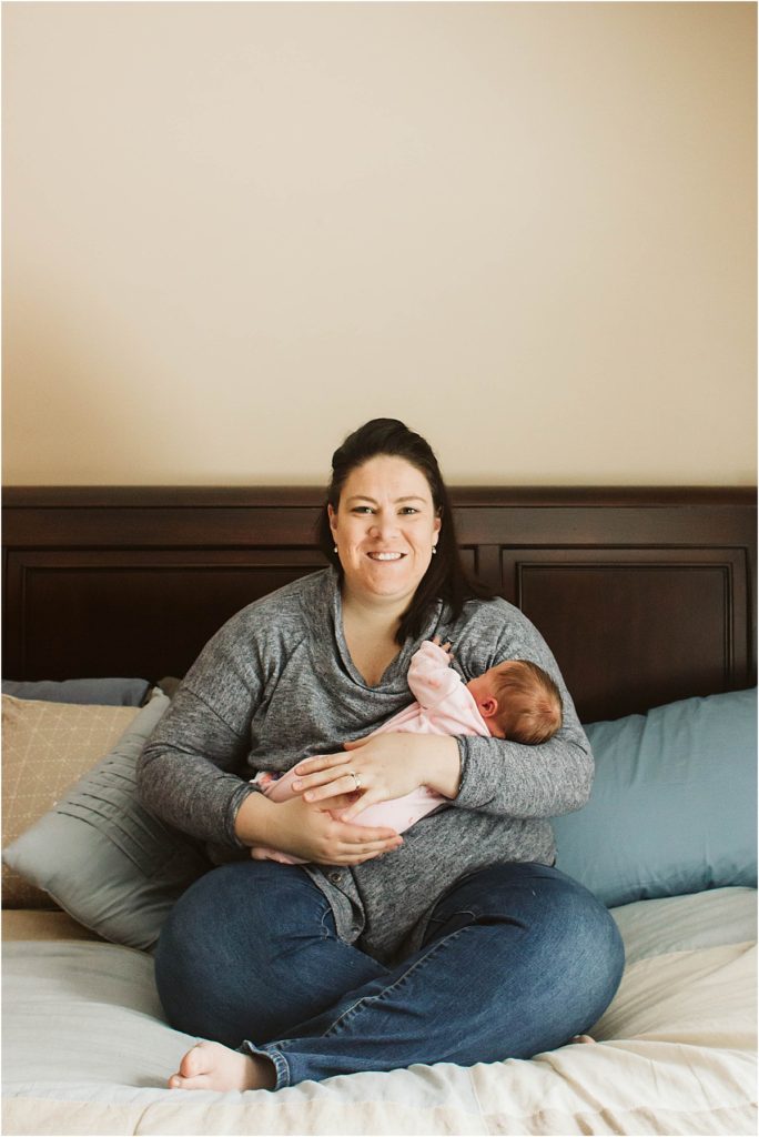 Stephanie holding her newborn daughter, Eleanor.