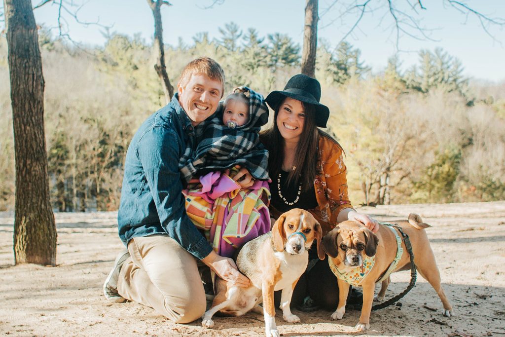 Grand Rapids couple Chase and Traci pose with their daughter and two dogs at Provin Trails.