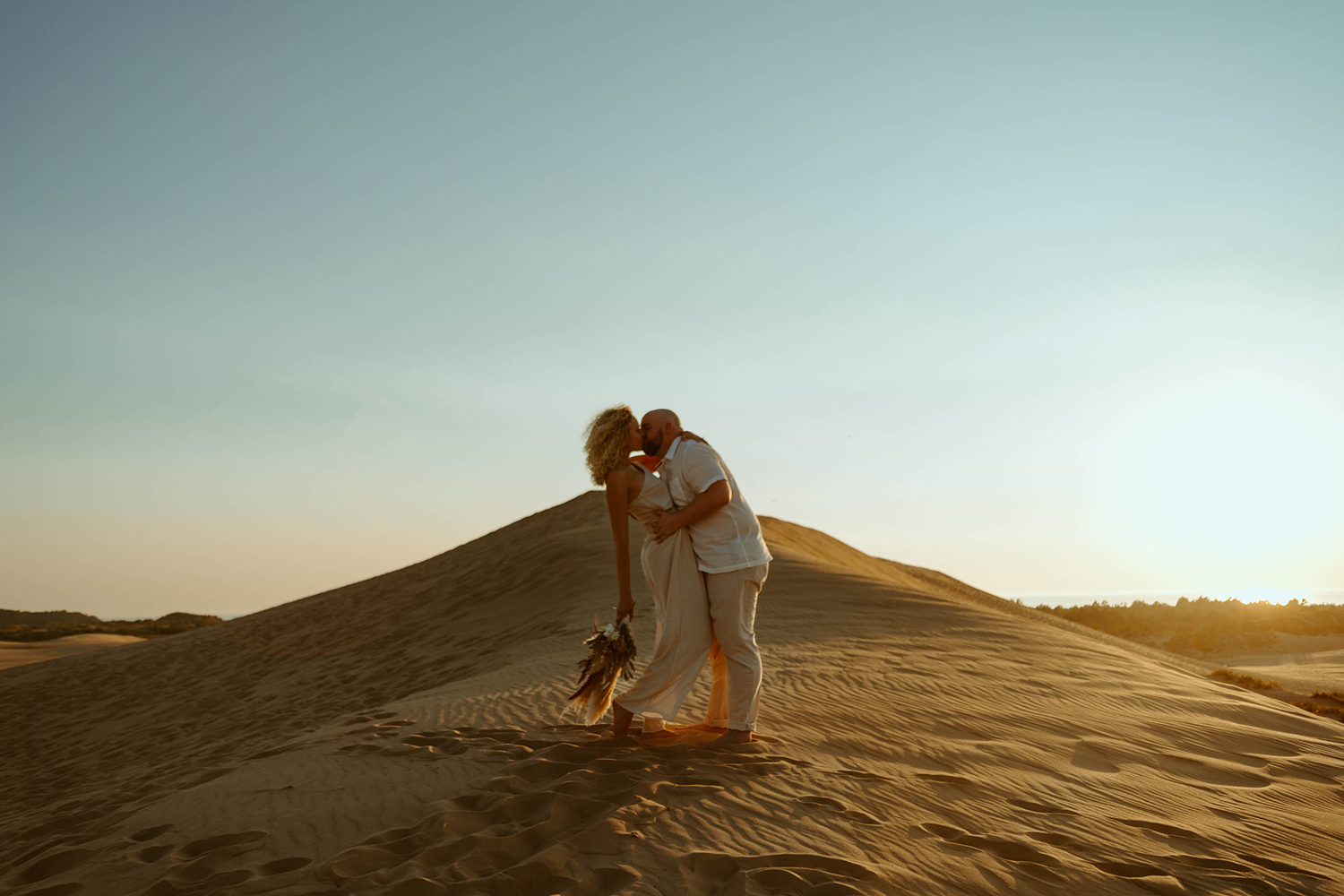 Couple's engagement session at Silver Lake Sand Dunes