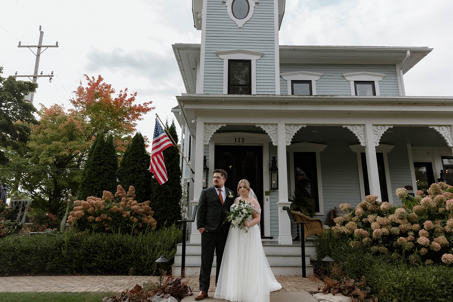Bride and Groom outside the Lilley Mansion on their wedding day.